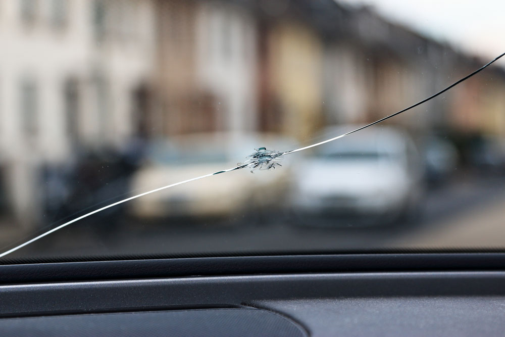 Glass Replacement Crack,of,the,windshield,after,rockfall